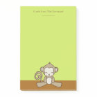 Singe assis en bas à l'air heureux mignonne & Kawa