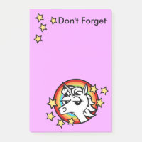 UNICORN DE FUNNY ET NOTEPAD GRAPHIQUE DE PLANCHE