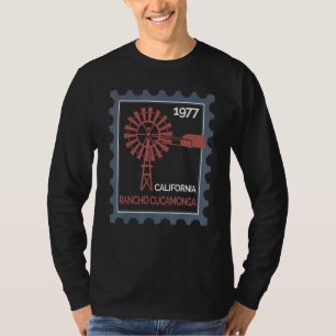 Postage Stamp With An Old Wind Turbine In Rancho C T-Shirt