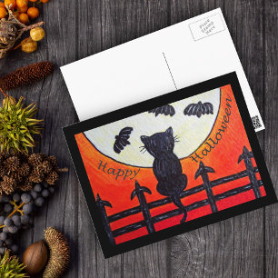 Postale Chat d'Halloween sur une clôture dans la carte pos