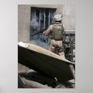 Poster A military policeman uses a breaching round
