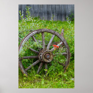 Poster Ancienne roue de wagon dans la vieille ville histo