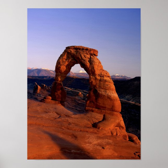 Poster Arc délicieux au coucher du soleil avec la neige r (Devant)