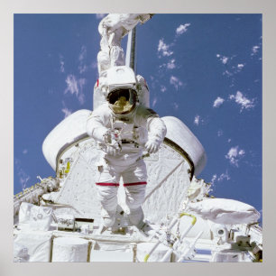 Poster Astronaut relié au système de manipulateur à dista