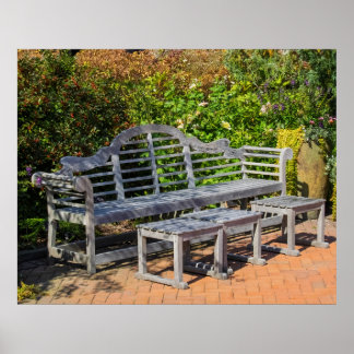 Poster Banc en bois dans un jardin luxuriant