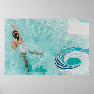 Poster Girl wearing swimsuit and swims in swimming pool