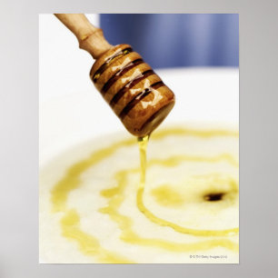 Poster Gros plan de miel qui bouillonne sur un dessert
