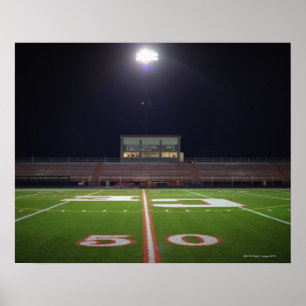 Poster Illuminated American football field at night