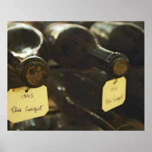Poster In the underground wine cellar: lying bottles in