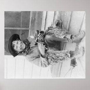 Poster Jeune garçon habillé en cowboy avec jouets