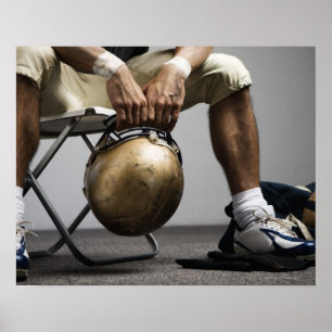 Poster Joueur de football assis dans le vestiaire