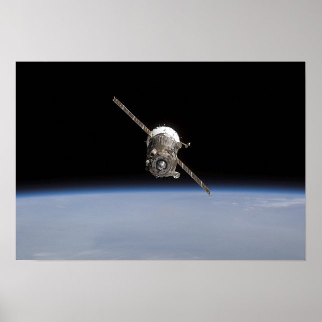 Poster L'engin spatial Soyouz TMA-11 au-dessus du horiz t (Devant)
