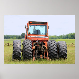 Poster Old 4 Rear Tired Tractor Sitting In A Field
