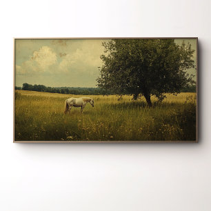 Poster Un cheval blanc paissant dans un champ