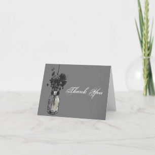 Pot de maçon et carte de note de fleurs sauvages