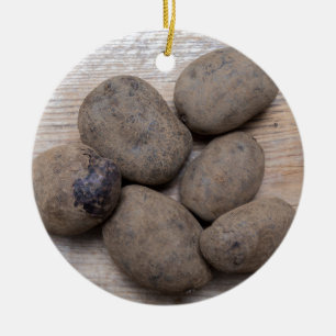 Potatoes on rustic wood Concept Ceramic Ornament