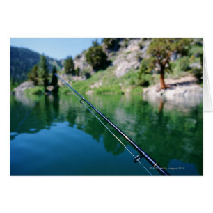 Poteau de pêche et lac