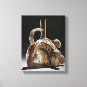 Pottery vessel of a frog climbing a cocoa tree canvas print