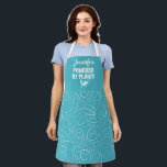 Powered by plants Vegan turquoise floral with name Apron<br><div class="desc">Elegant apron featuring a delicate floral white pattern on a turquoise background,  with the caption Powered by plants in white lettering decorated with tiny leaves. Easily customizable by adding your name.</div>