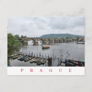 Prague Charles Bridge and boats view postcard