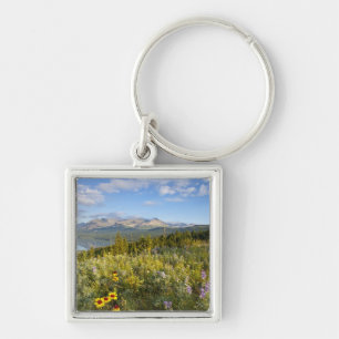Prairie wildflowers and Lower Two Medicine Lake Keychain