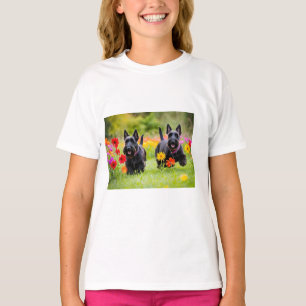 Prancing Scottish Terriers in grass and flowers T-Shirt