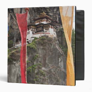 Prayer flags hang near Taktshang Binder