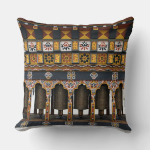 Prayer Wheels in a small public square Throw Pillow