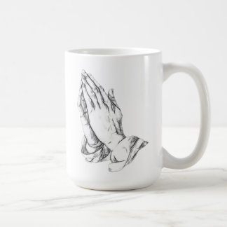 Praying hands coffee mug