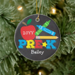Pre-K Preschool Keepsake Apple Crayons Chalkboard Ceramic Ornament<br><div class="desc">Pre-K ornament design features an apple, a pencil, colourful crayons and bold, fun typography! Click the customize button for more options for modifying the text! Variations of this design, additional colours, as well as coordinating products are available in our shop, zazzle.com/store/doodlelulu. Contact us if you need this design applied to...</div>