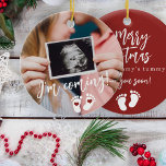 Pregnancy Merry Christmas baby ultrasound photo Ceramic Ornament<br><div class="desc">Modern funny I'm coming see your soon script,  footprints,  and hearts new baby expecting keepsake Merry Christmas from mommy's tummy red tree ornament with your custom ultrasound photo.</div>