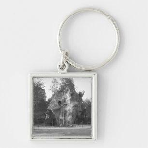Prehistoric house keychain