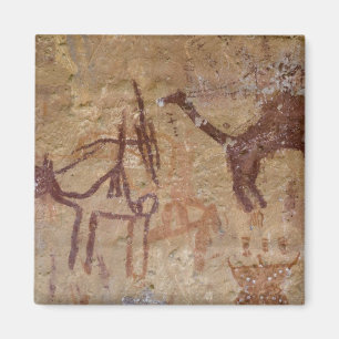 Prehistoric rock paintings with camels and magnet