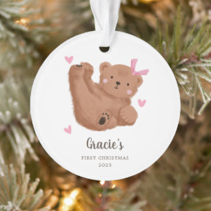 Premier Noël de l'ours de bébé rose mignon