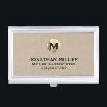 Premium Beige Linen Gold Monogram Business Card Holder<br><div class="desc">Show off your style and sophistication with this premium beige linen business card case featuring a luxurious gold monogram. Featuring a brushed gold monogram medallion with your name company and title in classic block typography, this case is a great way to keep your business cards organized and protected. The beige...</div>