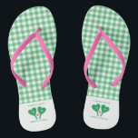 Preppy Green and Pink Wedding Pickleball Flip Flops<br><div class="desc">Whether you're chilling out after hitting the pickleball court or chilling out before your big day, these personalized flip-flops are the perfect footwear. They feature a green and white gingham pattern as well as illustrations of green and white heart-shaped pickleball paddles and a pink pickleball. These are ready to be...</div>