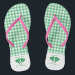Preppy Green and Pink Wedding Pickleball Flip Flops<br><div class="desc">Whether you're chilling out after hitting the pickleball court or chilling out before your big day, these personalized flip-flops are the perfect footwear. They feature a green and white gingham pattern as well as illustrations of green and white heart-shaped pickleball paddles and a pink pickleball. These are ready to be...</div>