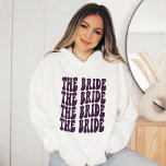 Preppy Purple Trendy Groovy Disco Bride Custom Sw Hoodie<br><div class="desc">Are you looking for the perfect bachelorette party shirt? Look no further than this personalized purple disco hoodie sweatshirt! This unique hoodie is perfect for any bride-to-be who wants to look stylish and chic on her big day. Not only is this hoodie comfortable and stylish, but it makes a great...</div>