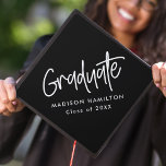 Preppy Script Black and White Graduation Cap Topper<br><div class="desc">Customize your graduation cap by adding a personalized graduation cap topper. The graduation cap topper features "Graduate" in a white handwritten script with a black background or colour of your choice. Personalize the black and white graduation cap topper by adding the graduate's name and graduation year.</div>
