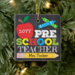 Preschool Teacher Pre-K Keepsake Bright Ceramic Ornament<br><div class="desc">Preschool teacher ornament design features an apple, crayons, a pencil and bold, colourful fun typography! Click the customize button for more options for modifying the text! Variations of this design, additional colours, as well as coordinating products are available in our shop, zazzle.com/store/doodlelulu. Contact us if you need this design applied...</div>