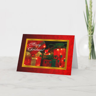 Présente la carte de Noël en métal rouge