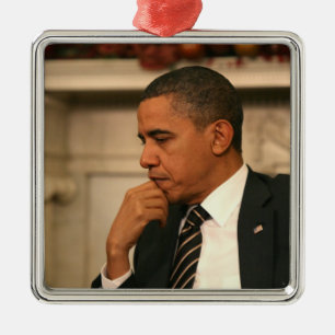 President Barack Obama reflects as he meets Metal Ornament