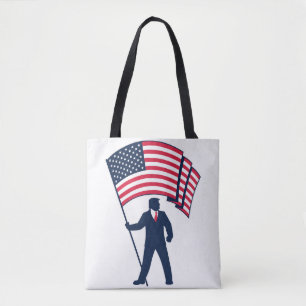 President Trump Bearing the Flag of the USA Tote Bag