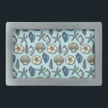 Pretty Blue Shell Starfish Sea Pattern Rectangular Belt Buckle<br><div class="desc">This pretty, blue and cream seashell and starfish pattern conjures up images of the beach and summer. There are five varieties of shells in the design and one starfish. Perfect for nautical / beach / ocean / coastal theme style and decor. The light blue background colour can be customized to...</div>