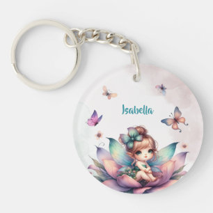 Pretty fairy sitting inside flower keychain