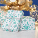 Pretty Green Christmas Snowflakes on Winter White Wrapping Paper<br><div class="desc">Mixed sized pretty pastel green snowflakes are scattered throughout this Christmas seasonal pattern. This cute festive design with a crisp winter white background is sure to please any age and perfect for anyone who likes soft and delicate xmas patterns.</div>