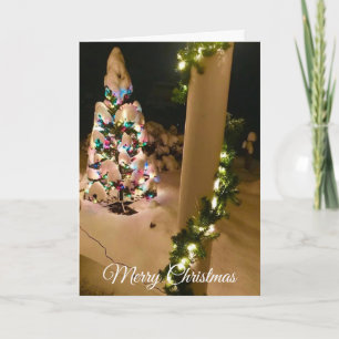 Pretty Lit up Christmas Tree Covered in Snow Card