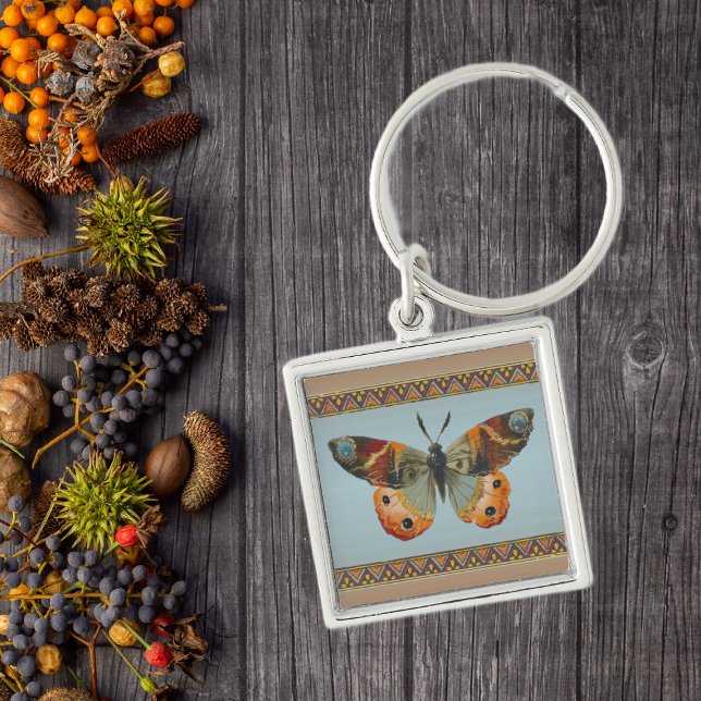 Pretty Monarch Butterfly Abstract Border Keychain (Pretty monarch butterfly in oranges blues with triangle border on keychain.)