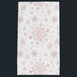 Pretty Pink Christmas Snowflakes on Winter White   Small Gift Bag<br><div class="desc">Mixed sized pretty pink snowflakes are scattered throughout this Christmas seasonal pattern. This cute festive design with a crisp winter white background is sure to please any age and perfect for anyone who likes soft and delicate xmas patterns.</div>