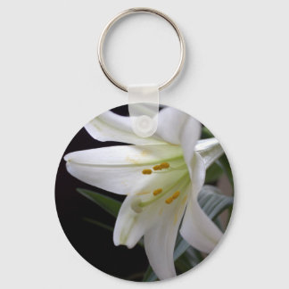 Pretty, pure white Easter lily flower in black Keychain